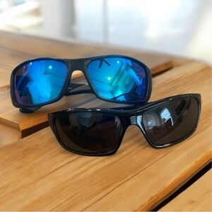 Two pair Ozark Trail polarized Black and uv400 Blue Sunglasses